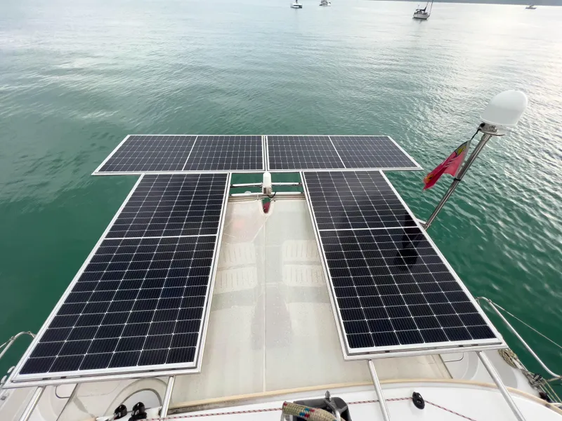 Slide: The Image of Solar panels on Antares PDQ 44 yacht, 2005 model, floating on calm water. - 10