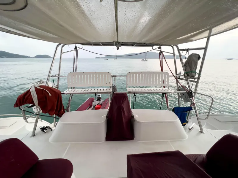 Slide: The Image of Sailing yacht Antares PDQ 44, 2005 model, with ocean view and seating area. - 16