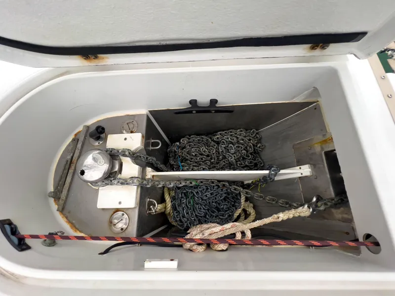 Slide: The Image of Anchor locker of 2005 Antares PDQ 44 with chains and ropes. - 7