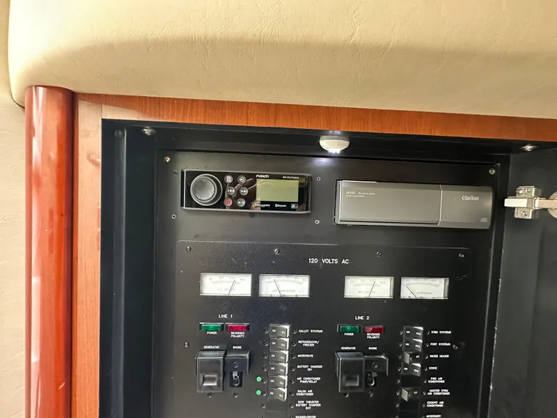 Slide: The Image of Electrical control panel of 2003 Sea Ray 420 Sundancer boat with audio system. - 40