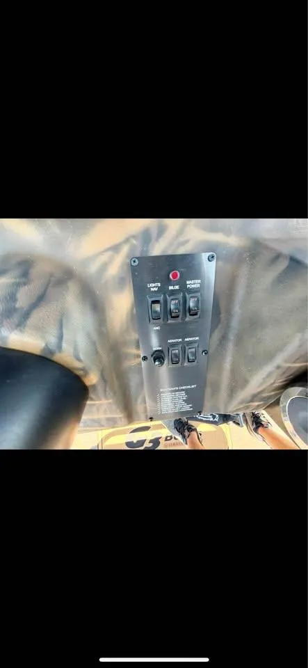 Slide: The Image of Control panel on 2023 G3 Bay 20 GX boat, featuring switches and labels. - 10