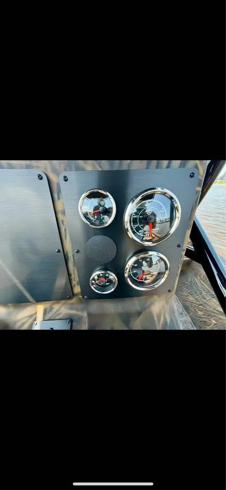 Slide: The Image of Instrument panel of 2023 G3 Bay 20 GX boat with gauges and controls. - 9