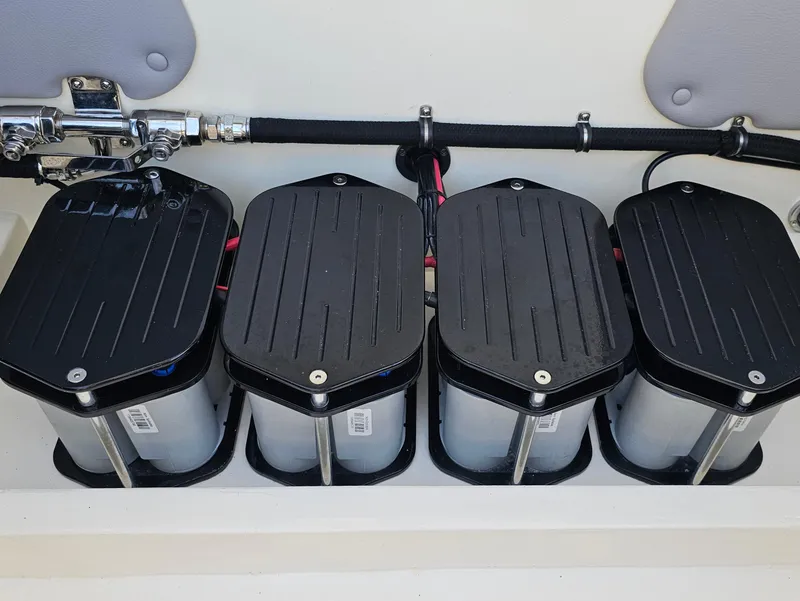 Slide: The Image of 2010 Daves Custom Boats M35 on display, featuring sleek blue and orange design. - 12