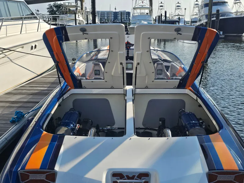 Slide: The Image of Underneath view of a 2010 Daves Custom Boats M35 hull on a trailer. - 23