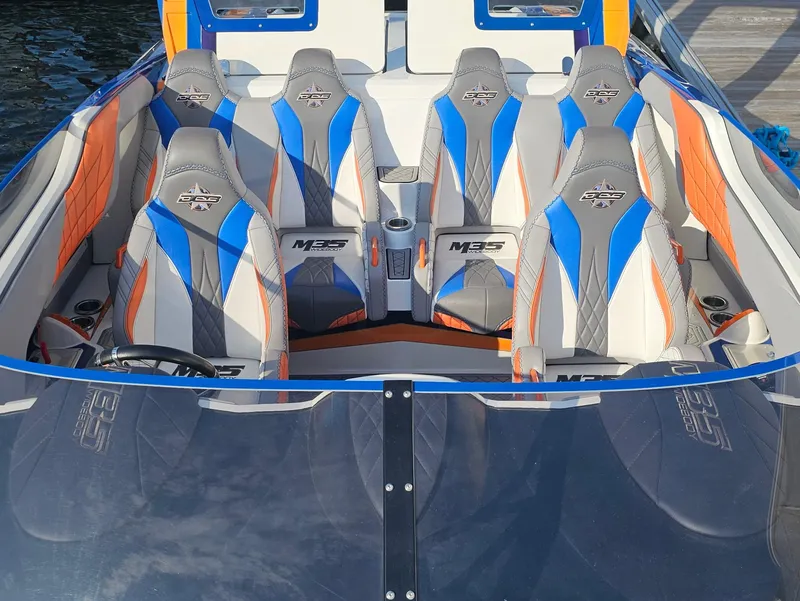 Slide: The Image of Underneath view of a 2010 Daves Custom Boats M35 on a trailer. - 25