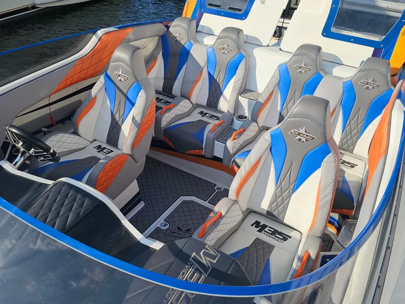 Slide: The Image of Underneath view of 2010 Daves Custom Boats M35 on a trailer. - 26