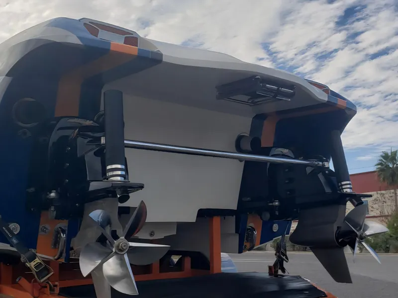 Slide: The Image of Interior of 2010 Daves Custom Boats M35, featuring steering wheel and control panel. - 42