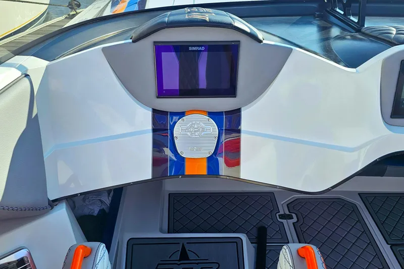 Slide: The Image of Dashboard of a 2010 Daves Custom Boats M35 with modern controls and vibrant design. - 44