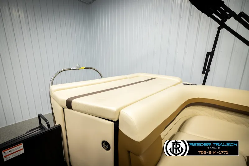 Slide: The Image of 2023 Lowe 210 SSTL boat interior with beige seating, showcased at Reeder-Trausch Marine. - 25