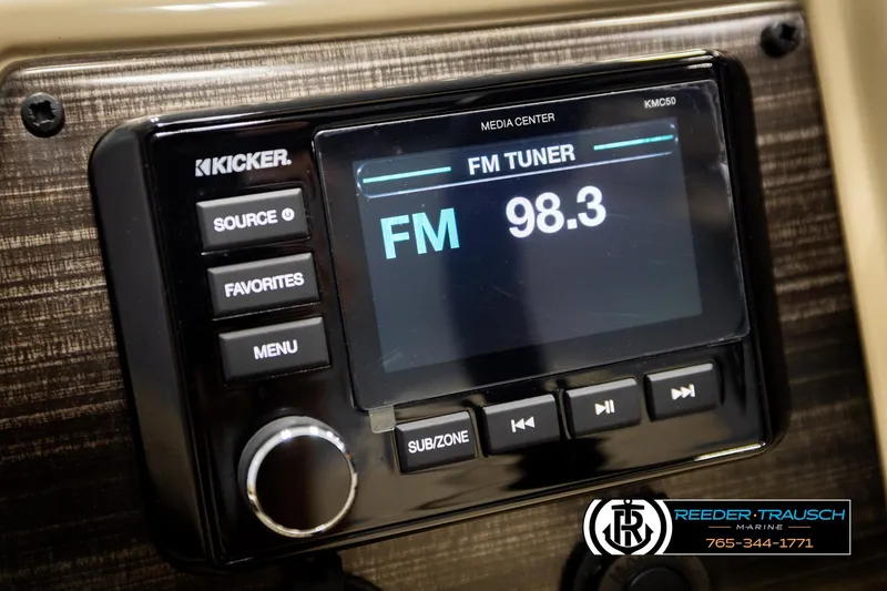 Slide: The Image of Kicker media center displaying FM tuner at 98.3, in a 2023 Lowe 210 SSTL boat. - 30