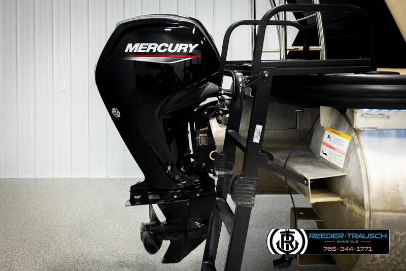 Slide: The Image of 2023 Lowe 210 SSTL boat with Mercury outboard motor in showroom. - 44