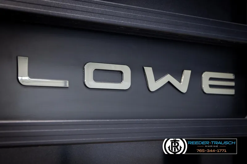 Slide: The Image of Alt text: "Lowe 210 SSTL 2023 logo on a dark background with Reeder-Trausch Marine branding." - 49