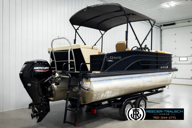 Slide: The Image of 2023 Lowe 210 SSTL pontoon boat with Mercury engine in showroom. - 6