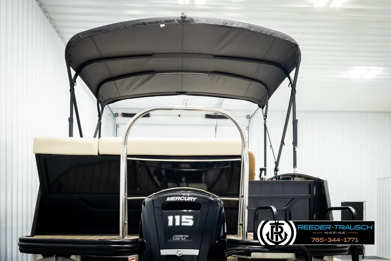 Slide: The Image of 2023 Lowe 210 SSTL boat with Mercury 115 engine in showroom. - 7