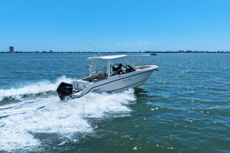 Slide: The Image of 2023 Boston Whaler 240 Vantage - Profile Stern 3/4 Starboard - 29