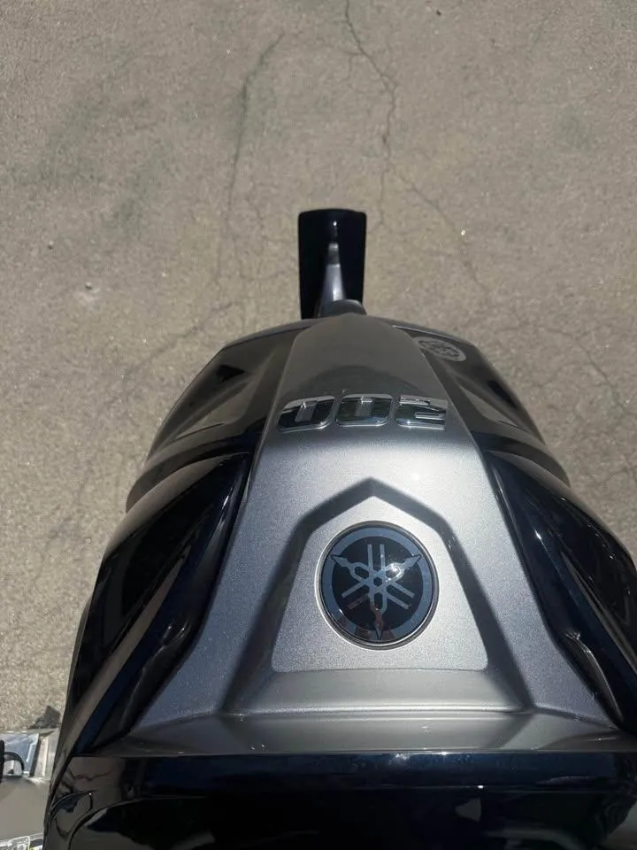 Slide: The Image of Top view of a 2025 Berkshire 22RFX CTS with Yamaha logo on a paved surface. - 10