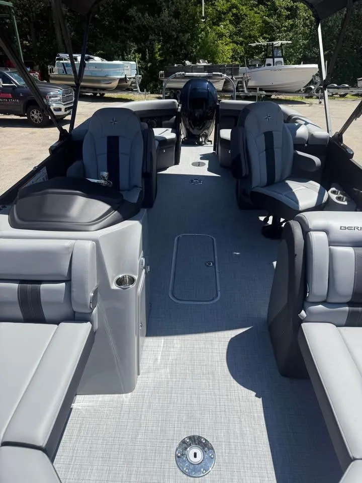 Slide: The Image of 2025 Berkshire 22RFX CTS pontoon boat interior with luxurious seating and modern design. - 3