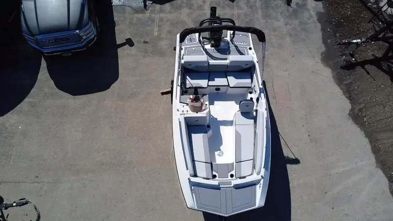 Slide: The Image of Aerial view of a 2025 Starcraft SV 16 OB boat parked on concrete. - 9