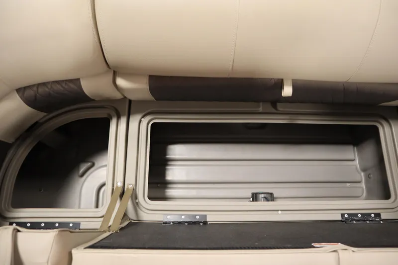 Slide: The Image of Storage compartment in 2023 Tracker 20 DLX PARTY BARGE pontoon boat interior. - 19