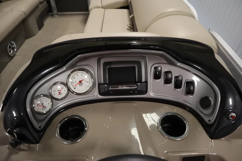 Slide: The Image of Dashboard of 2023 Tracker 20 DLX PARTY BARGE with gauges and controls. - 26