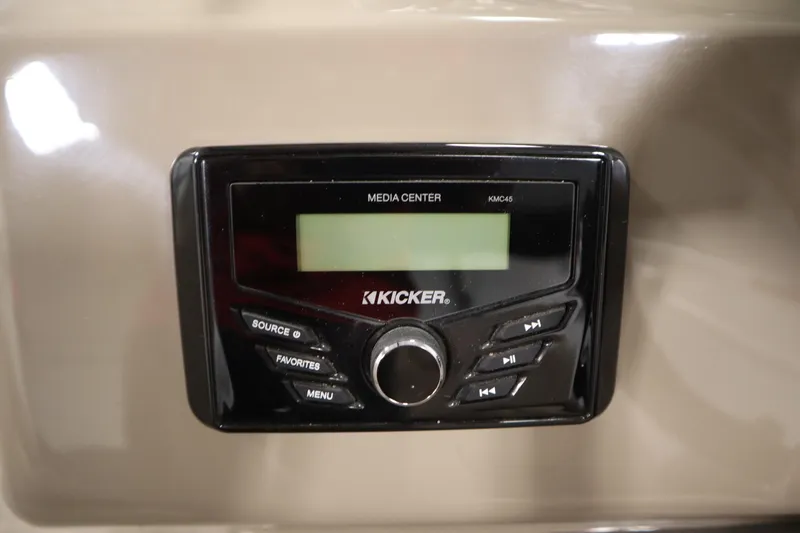 Slide: The Image of Kicker media center on 2023 Tracker 20 DLX PARTY BARGE boat dashboard. - 27