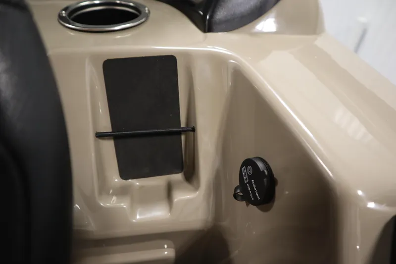 Slide: The Image of 2023 Tracker 20 DLX PARTY BARGE console with cup holder and audio input. - 28