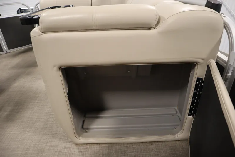 Slide: The Image of 2023 Tracker 20 DLX PARTY BARGE storage compartment with beige upholstery. - 33