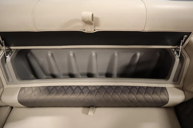 Slide: The Image of 2023 Tracker 20 DLX PARTY BARGE storage compartment with quilted upholstery detail. - 34