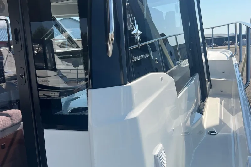 Slide: The Image of 2023 Jeanneau NC Weekender 1095 boat exterior with sleek design and modern features. - 34