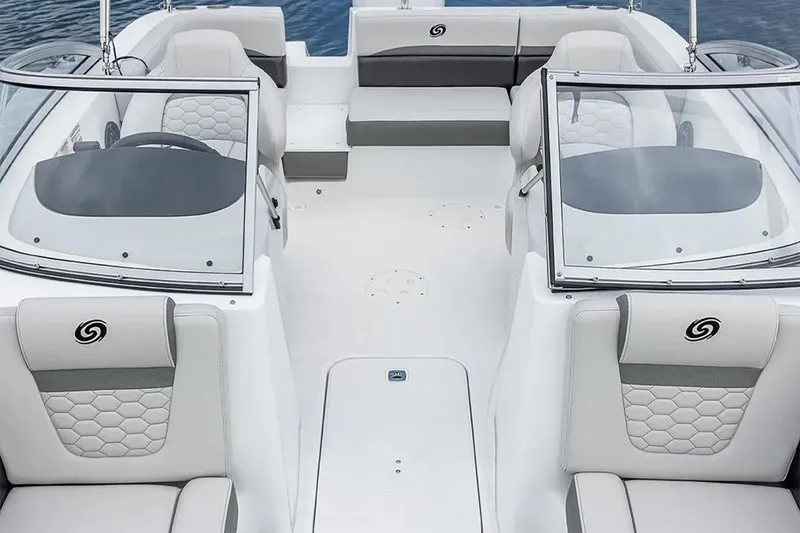 Slide: The Image of 2026 Hurricane SunDeck 2050 OB boat with swim platform and ladder under a clear sky. - 17