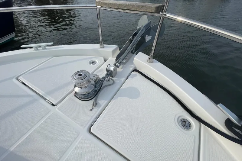 Slide: The Image of Bow of 2018 Beneteau Swift Trawler 35 with anchor and winch system. - 18