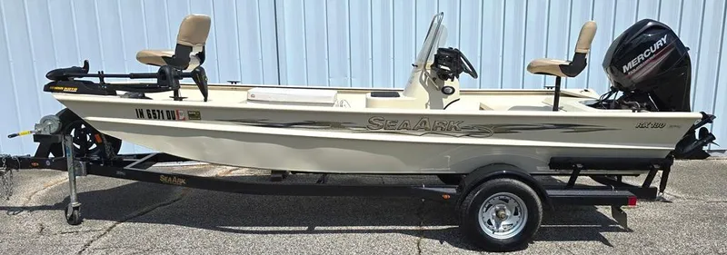 Slide: The Image of 2015 SeaArk RX18 Center Console boat with Mercury engine on trailer. - 0