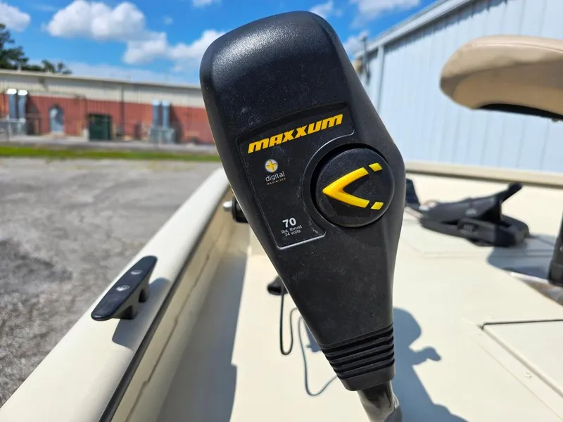 Slide: The Image of Close-up of Maxxum trolling motor on 2015 SeaArk RX18 Center Console boat. - 8