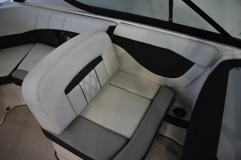Slide: The Image of 2026 Regal 2000 ES boat interior with white and black seating. - 13
