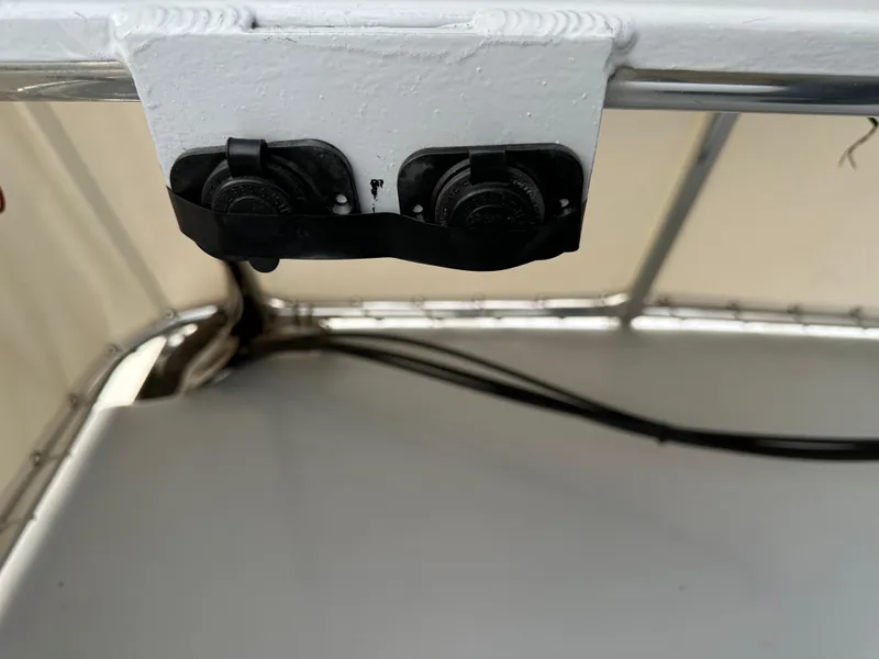 Slide: The Image of 2003 BHM Sport Fish boat detail showing electrical outlets under canopy. - 20
