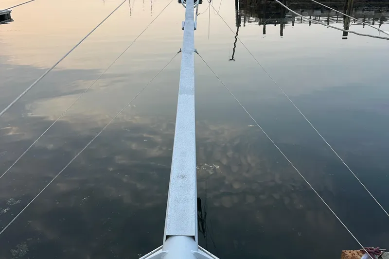 Slide: The Image of Bow of 2003 BHM Sport Fish boat on calm water at sunset. - 21