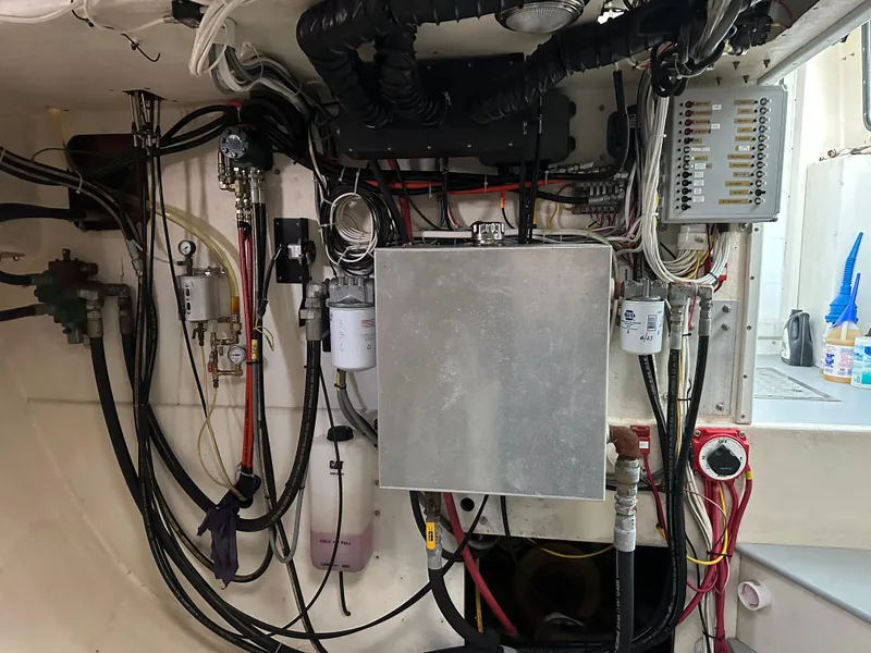 Slide: The Image of Engine room wiring and components of a 2003 BHM Sport Fish boat. - 27