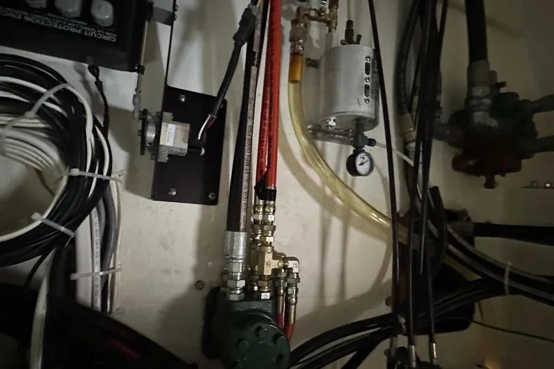 Slide: The Image of Engine room wiring and components of a 2003 BHM Sport Fish boat. - 34