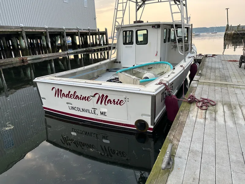 Slide: The Image of BHM Sport Fish 2003 boat "Madelaine Marie" docked in Lincolnville, ME. - 4