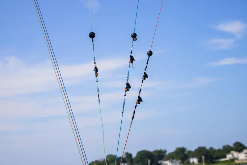 Slide: The Image of Control panel of 2022 Viking 54 Sport Coupe yacht in sunlight. - 34