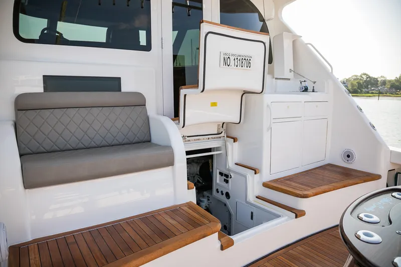 Slide: The Image of Interior helm of 2022 Viking 54 Sport Coupe with advanced navigation displays. - 42