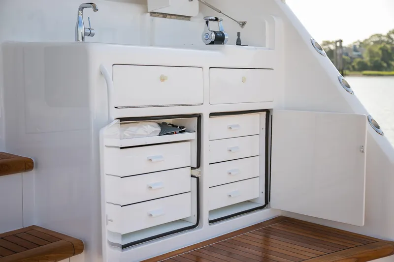 Slide: The Image of Interior helm of 2022 Viking 54 Sport Coupe with advanced navigation systems. - 45