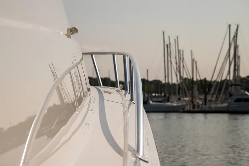 Slide: The Image of 2022 Viking 54 Sport Coupe helm with advanced navigation displays and luxurious interior. - 46