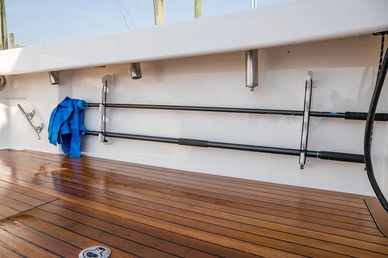 Slide: The Image of Luxurious interior of 2022 Viking 54 Sport Coupe yacht with modern wood finishes. - 53