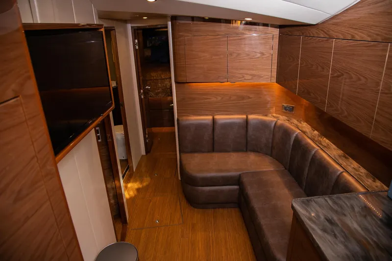 Slide: The Image of Engine room of 2022 Viking 54 Sport Coupe, featuring advanced machinery and systems. - 67