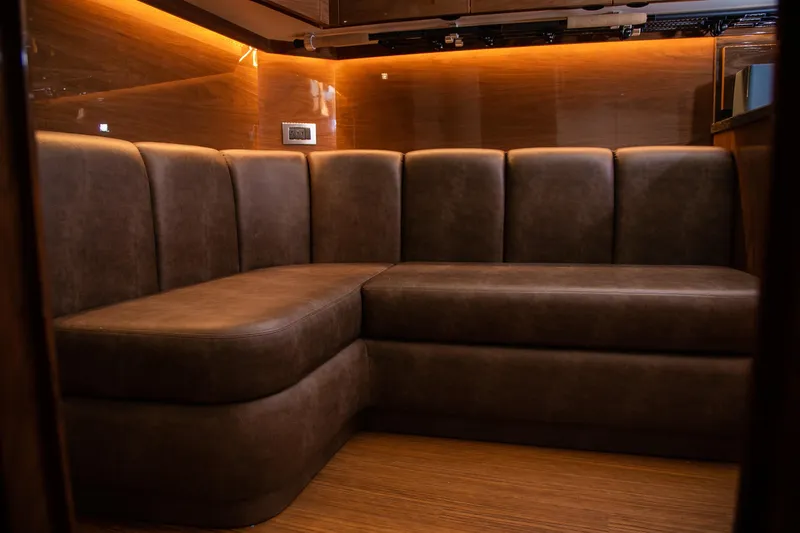 Slide: The Image of Engine room of 2022 Viking 54 Sport Coupe, featuring dual MAN engines. - 68