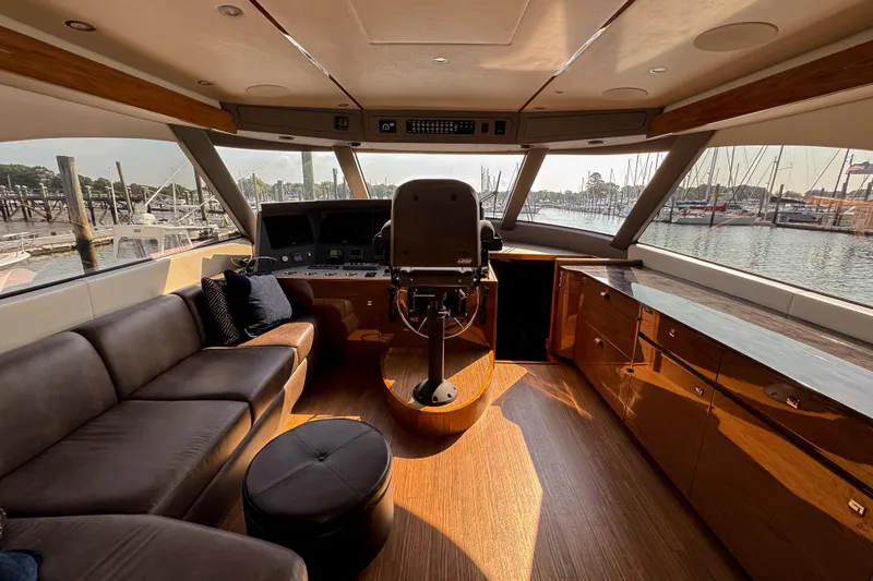 Slide: The Image of Engine room of 2022 Viking 54 Sport Coupe with MAN engines and Cummins generator. - 69