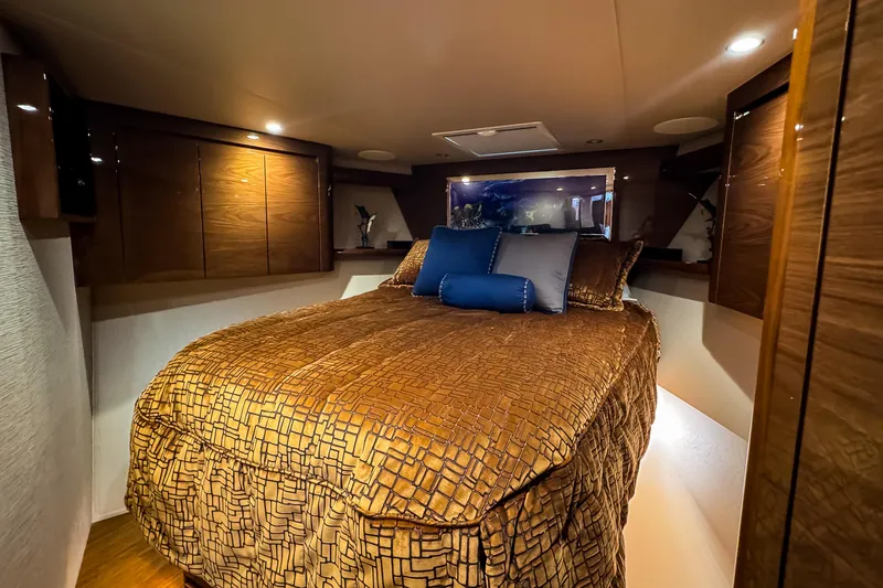 Slide: The Image of Engine room of 2022 Viking 54 Sport Coupe with visible machinery and components. - 72