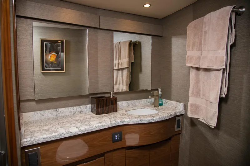 Slide: The Image of V12 engine of 2022 Viking 54 Sport Coupe, showcasing power and performance. - 77