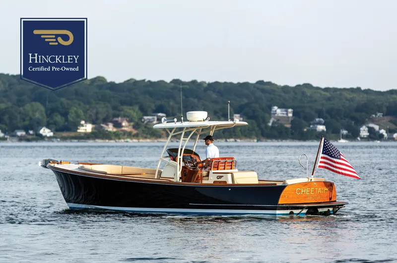 The Image of 2014 Hinckley T29 CC boat on water, American flag, certified pre-owned. - 0